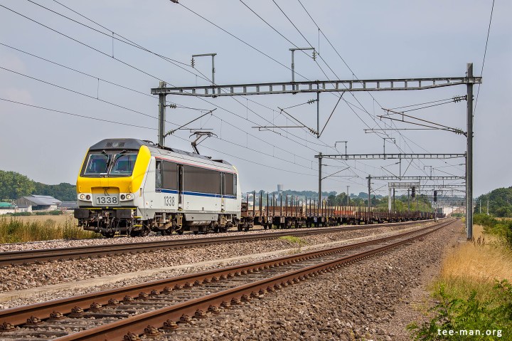 B-Logistic's 1338 hauls an empty steel train towards Bettembourg. Fentange, 8.8.2015