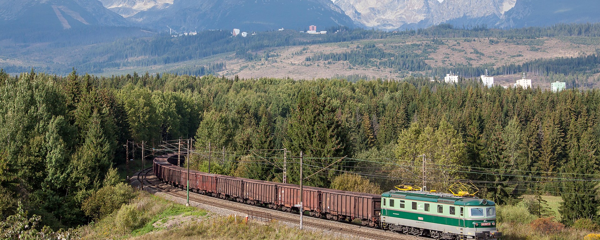 Vintage electric 183 017 pushes a train up the hill. Strba, 23.9.2016